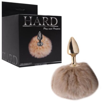 Plug De Metal Dourado Com Rabo Pompom Claro – Hard